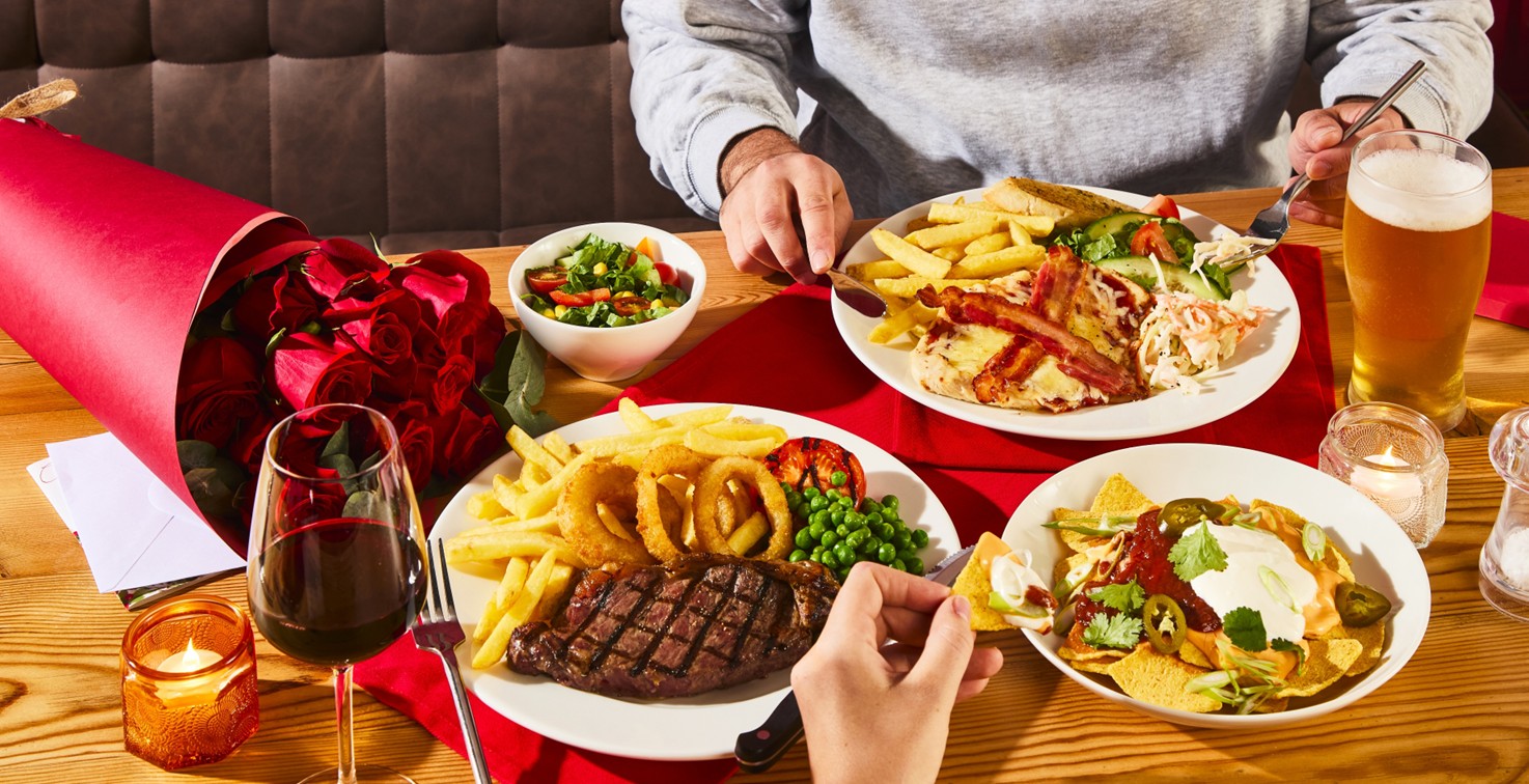food at table table for a valentines day meal